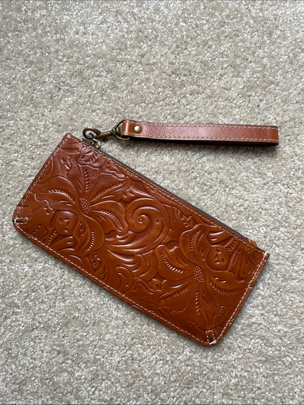 Patricia Nash Embossed Leather Wristlet in Cognac Brown